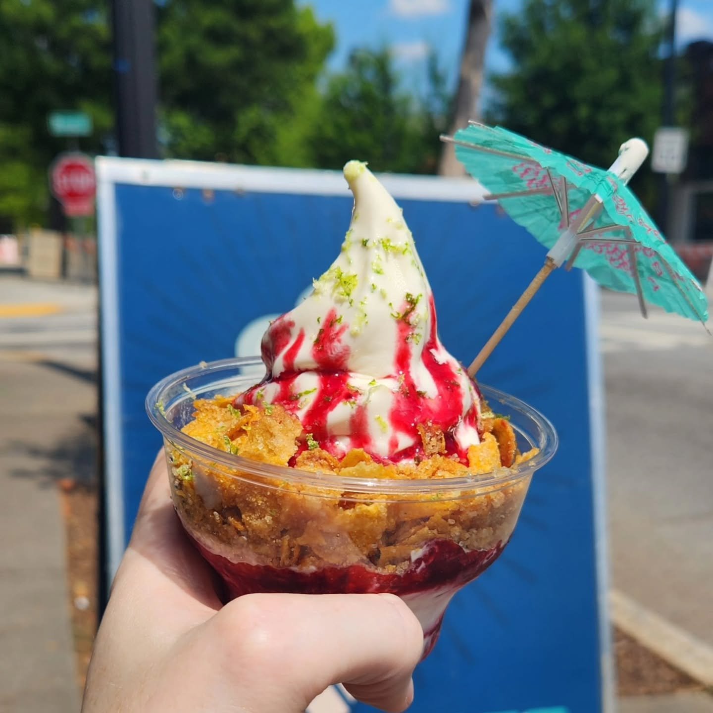 Its that special time of year when we bring back our B-Day Blackberry Lime Sundae in honor of Big Softie Summerhill's birthday! Four swirls of classic or vegan vanilla, blackberry sauce, cornflake streussel, and some fresh lime zest will have your ta