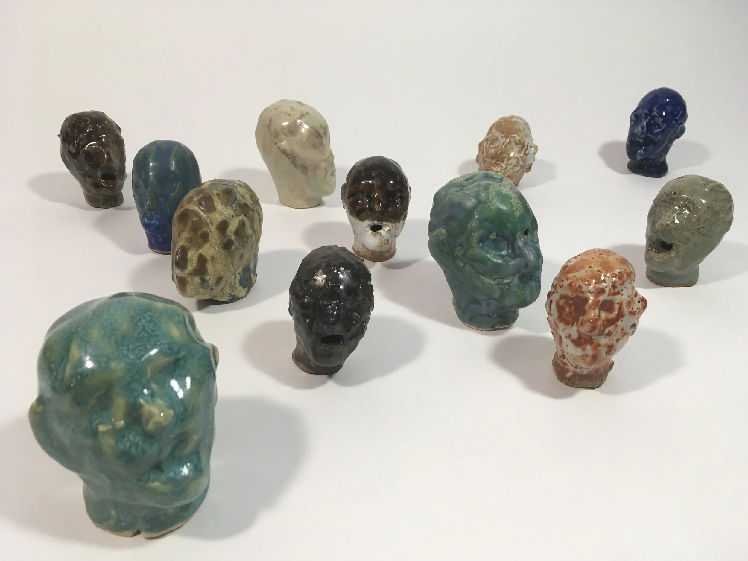  “Heads” white stoneware &amp; T-1, 2018-2019 