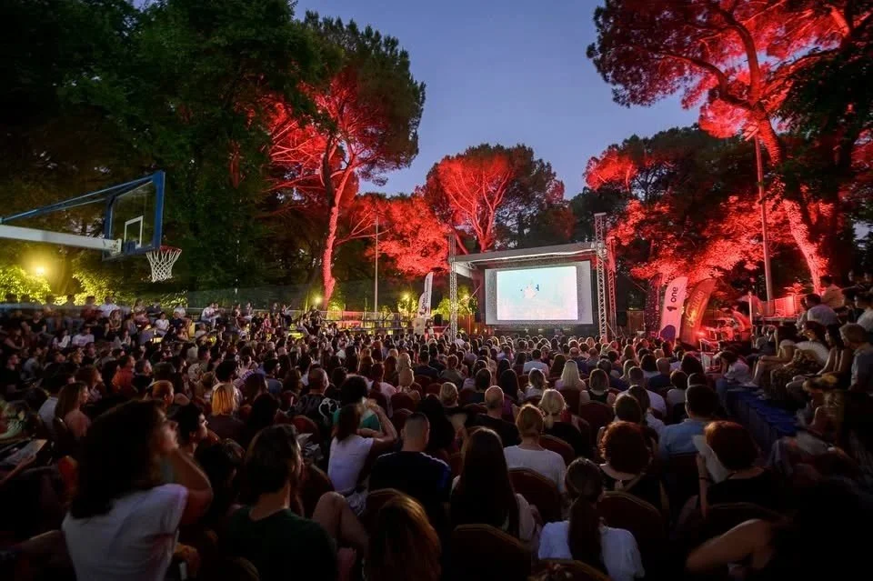 Underhill Festival film screening in Njegošev Park, Podgorica with outdoor cinema setup and audience.