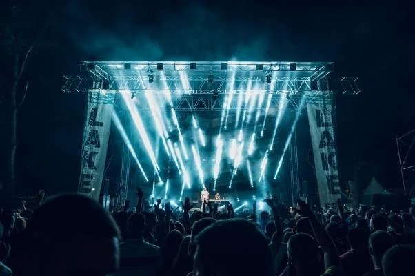 Visitors enjoying live music performances at Lake Fest on the shores of Krupac Lake in Nikšić, Montenegro.