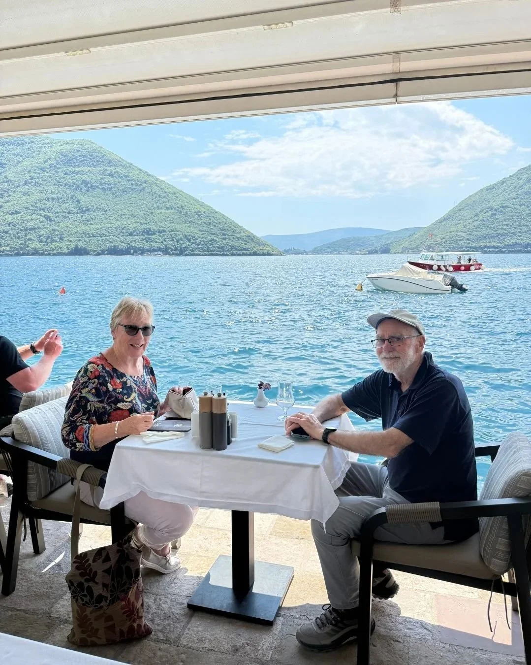 Couple dining with a sea view in Montenegro