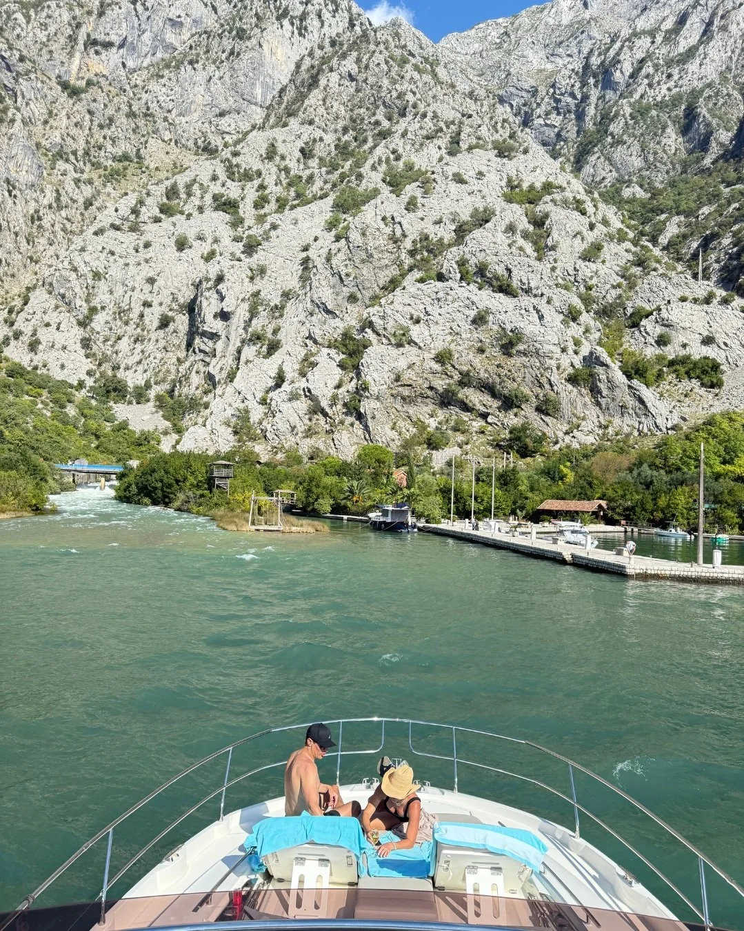 Boat cruising through the Bay of Kotor