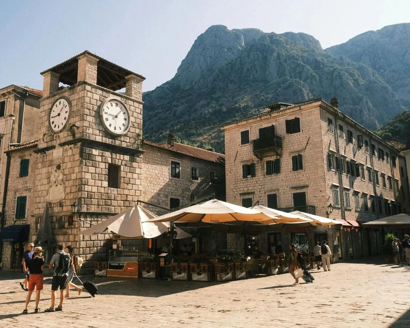 Old Town Kotor with stone streets, historic architecture, and surrounding mountains