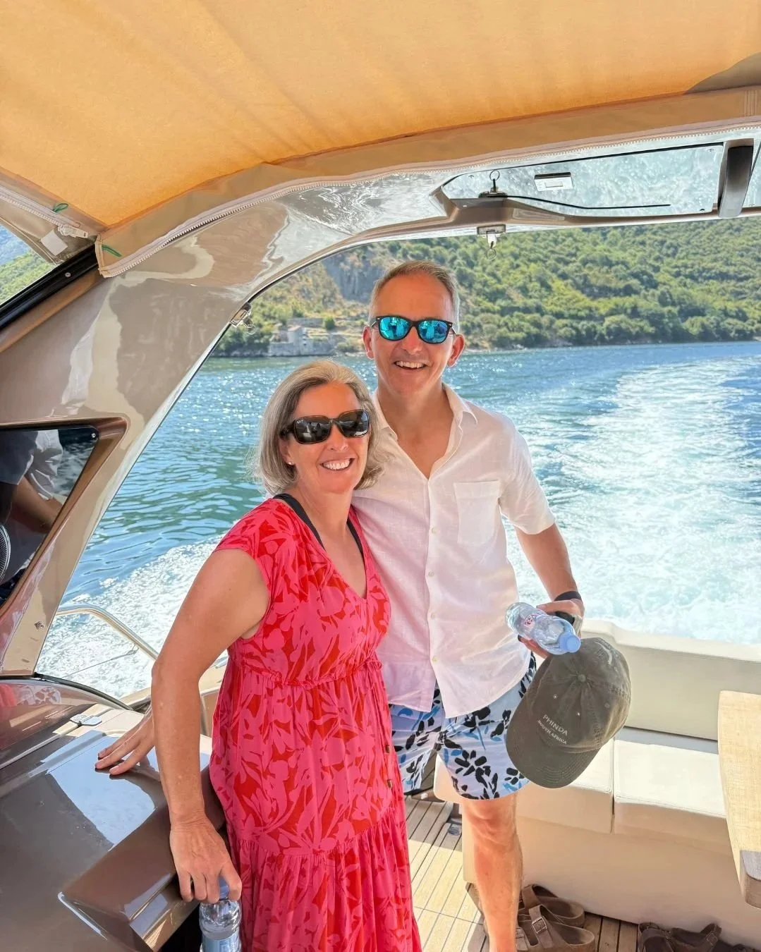 Couple enjoying a boat ride on the Montenegro coast