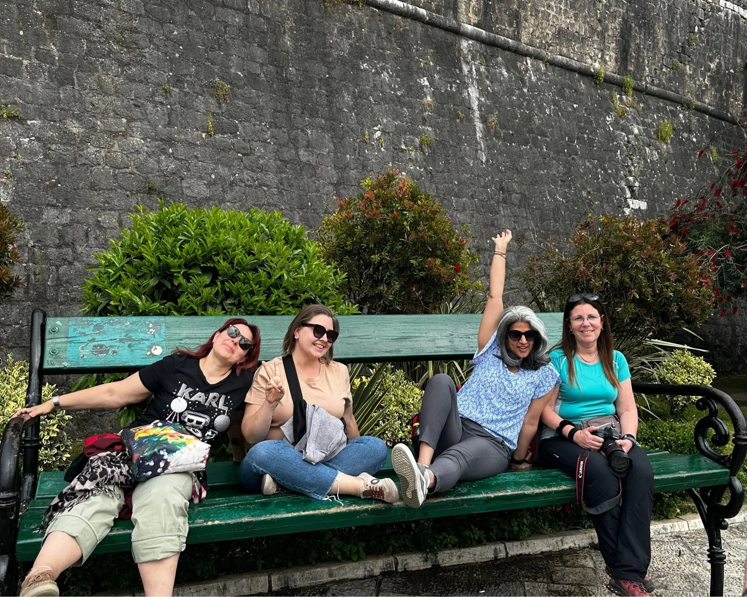 Guests on the giant bench viewpoint in Kotor.