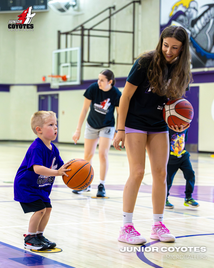 Coach Sarah Litrico working with a young Junior Coyotes player