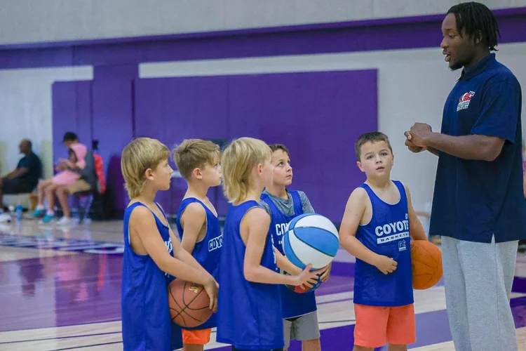 Coach Timi Orifa coaching young Junior Coyotes players in Kelowna