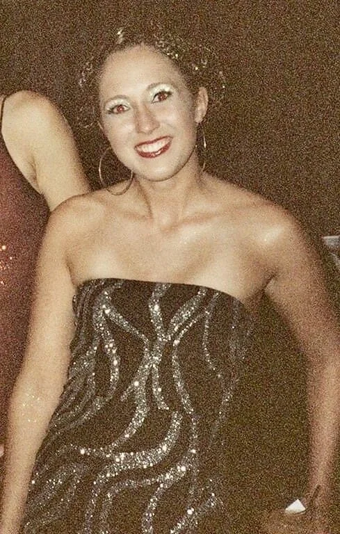 College makeup and hair consisting of light blue shimmer eyeshadow enhanced with rhinestones.  Droopy eyebrows randomly overly plucked and a dark chocolate colored lipstick smeared across my lips.  Lets not forget the crazy medusa style hair.