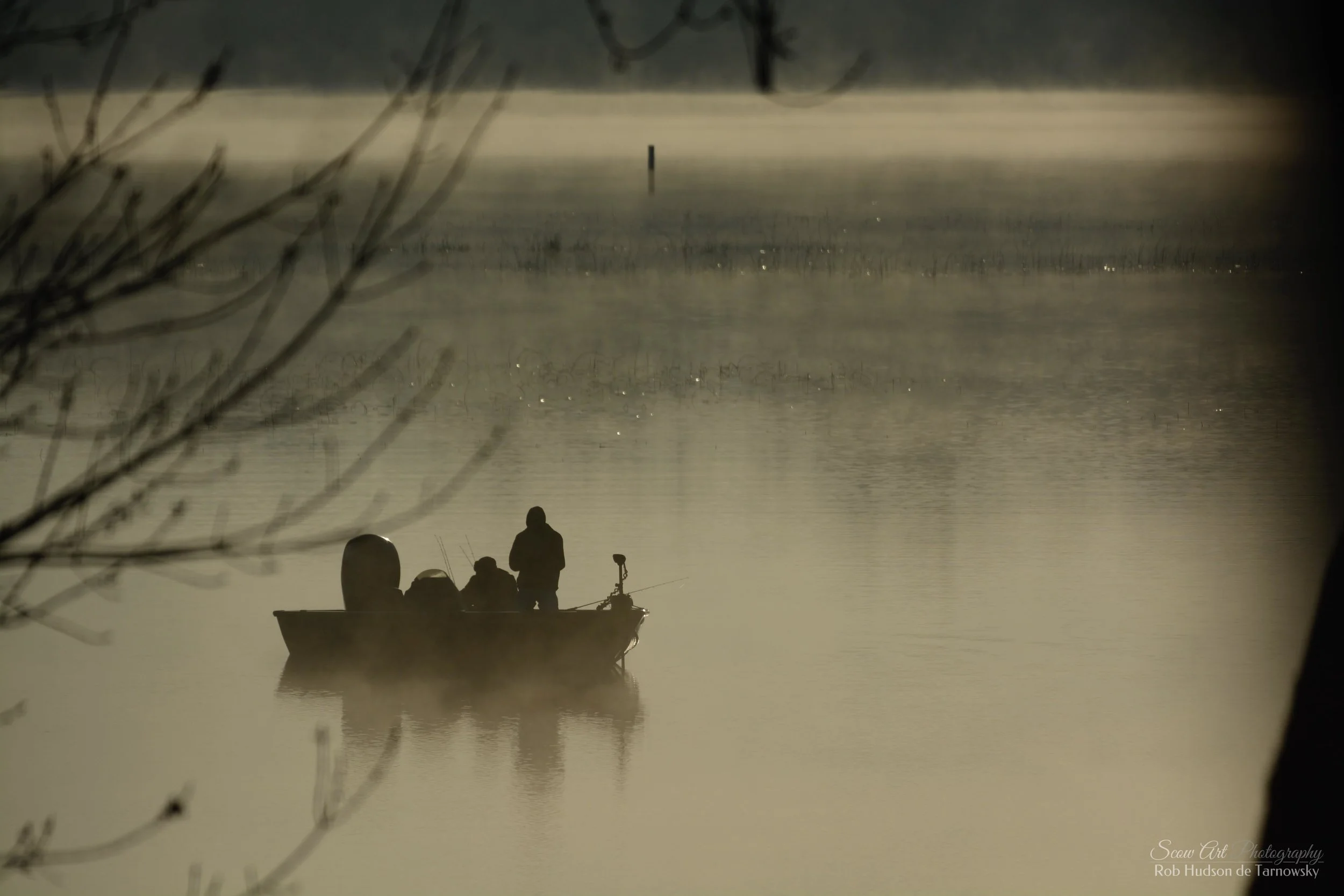 Fishermen in Beulah Cove by the main channel on Lake Beulah in early Spring 2019.