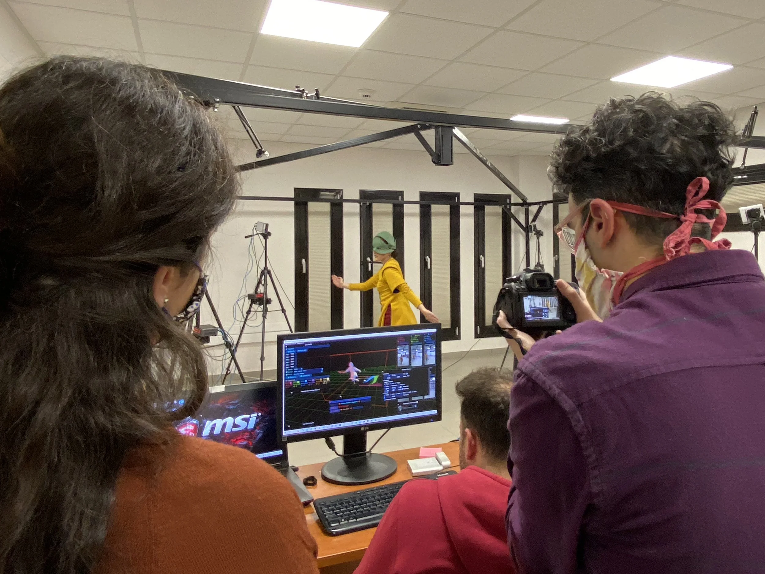  Argyris and Kyriaki observing the 4D scanning trials at CERTH’s ITI lab for Dance Walk. 