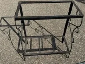 Two cast-iron fish tank stands. Add some wood shelves to repurpose for other uses.