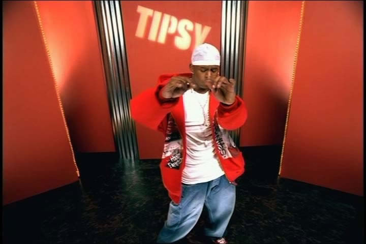 J-Kwon - Tipsy - music video // Designing with my favorite color, red, this performance stage was built in the backyard of the house set seen in the original video. Using wild walls, corrugated aluminum and rope lighting set the mood for a great music video.