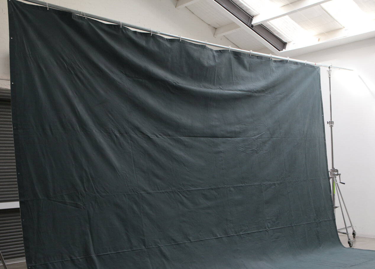 Dark Green Canvas Backdrop (15ft x 18ft) Hire