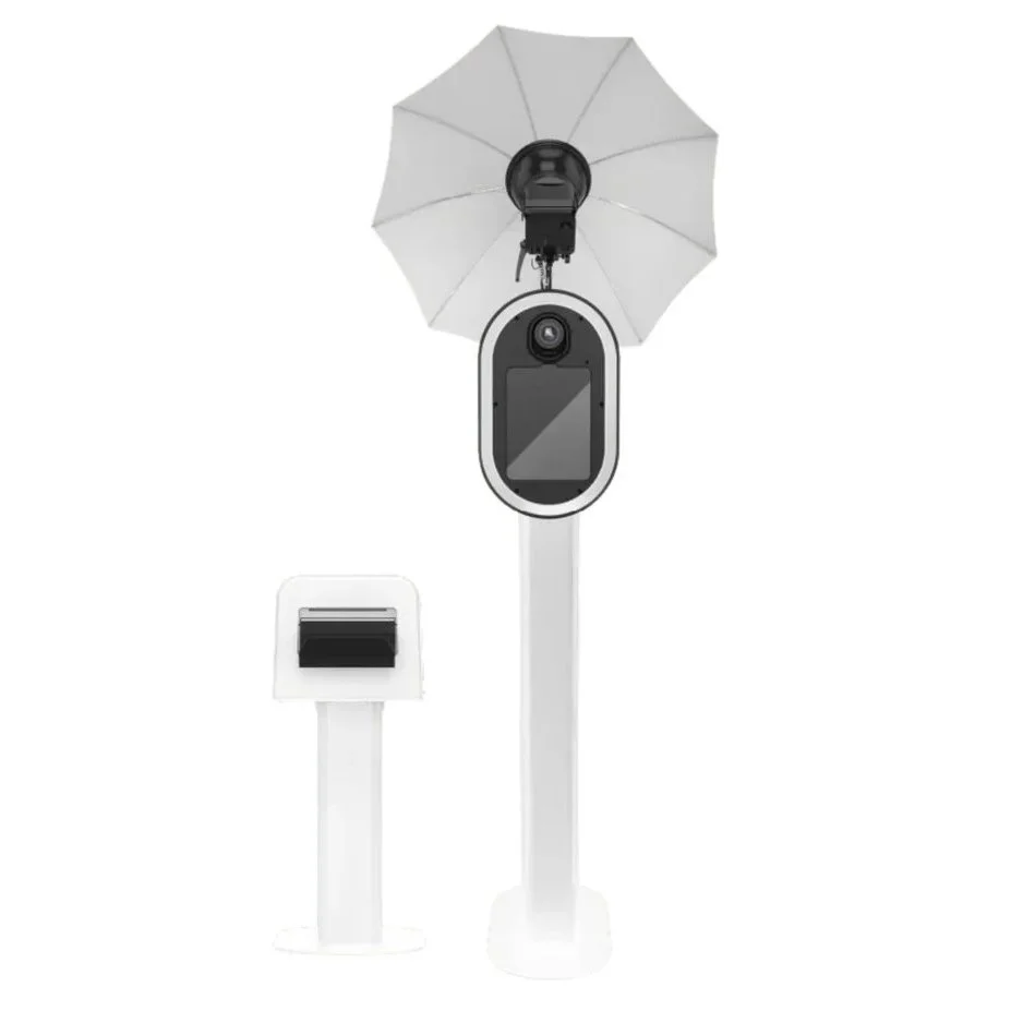 Glam Photo Booth setup featuring touch screen, DSLR camera, studio flash and printer on stand right next to it.