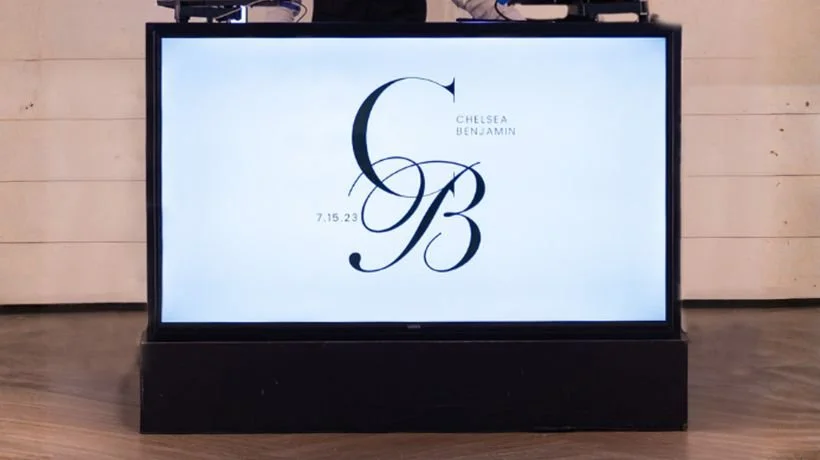 Digital display with a wedding monogram for Chelsea and Benjamin, featuring large initials C and B, with the wedding date 7.15.23.