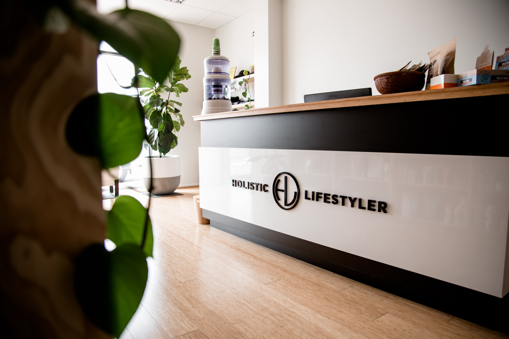 clinic reception desk, chiropractic care, Holistic Lifestyler