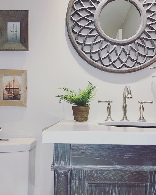 Love how this nautical inspired powder room turned out. The net like mirror, the white wash cabinet and cute boat imagery gives you a little escape and a sense of calm every time you visit this space. ⚓️ #HilsdenDesignCo #BurlingtonDesign #Burlington