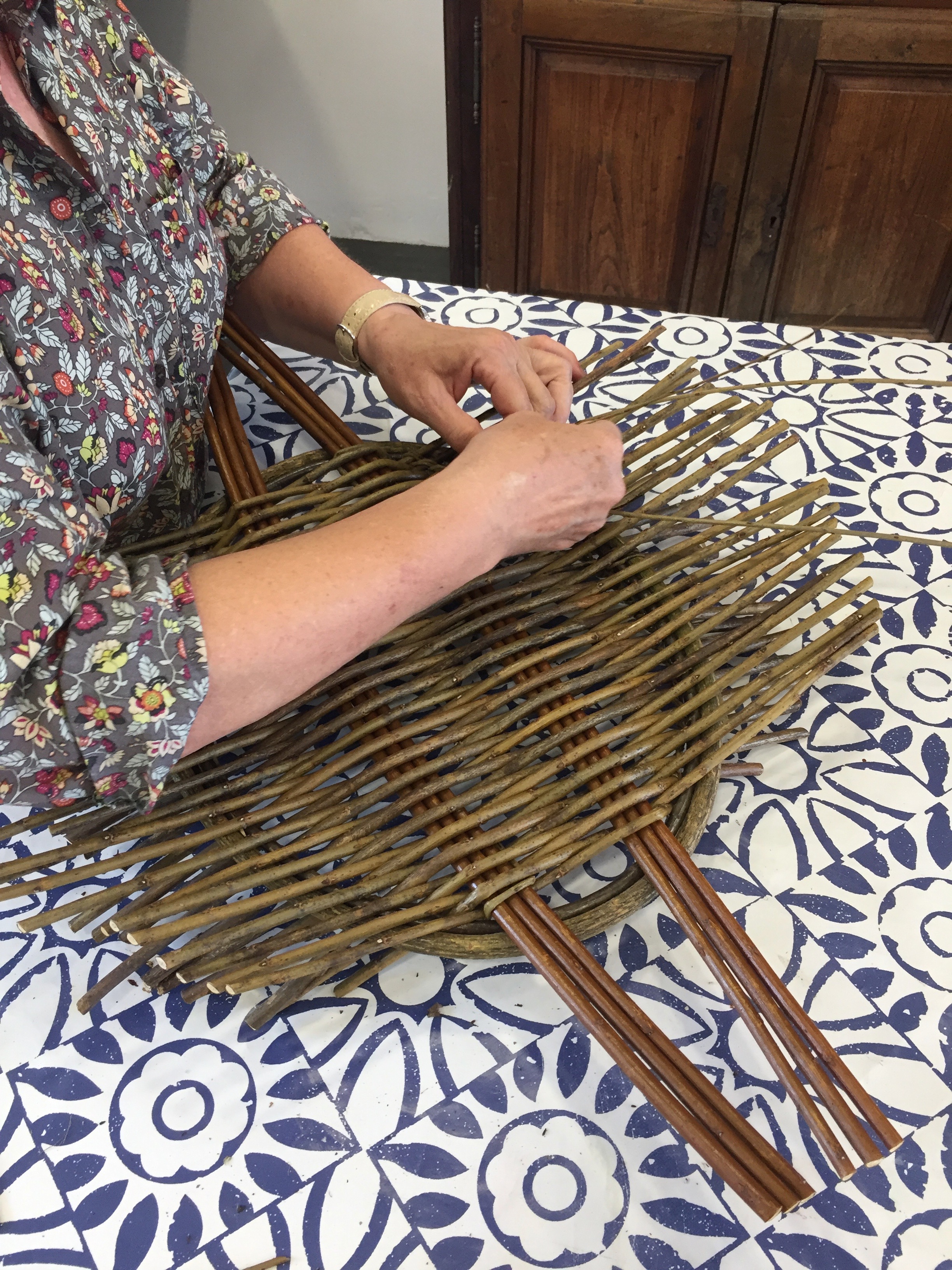 Working on a willow tray.jpg