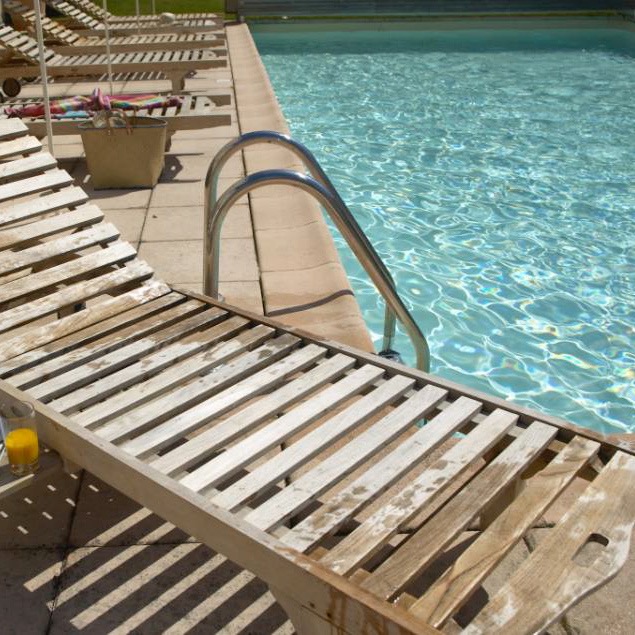 Teak loungers by the Pool.jpg