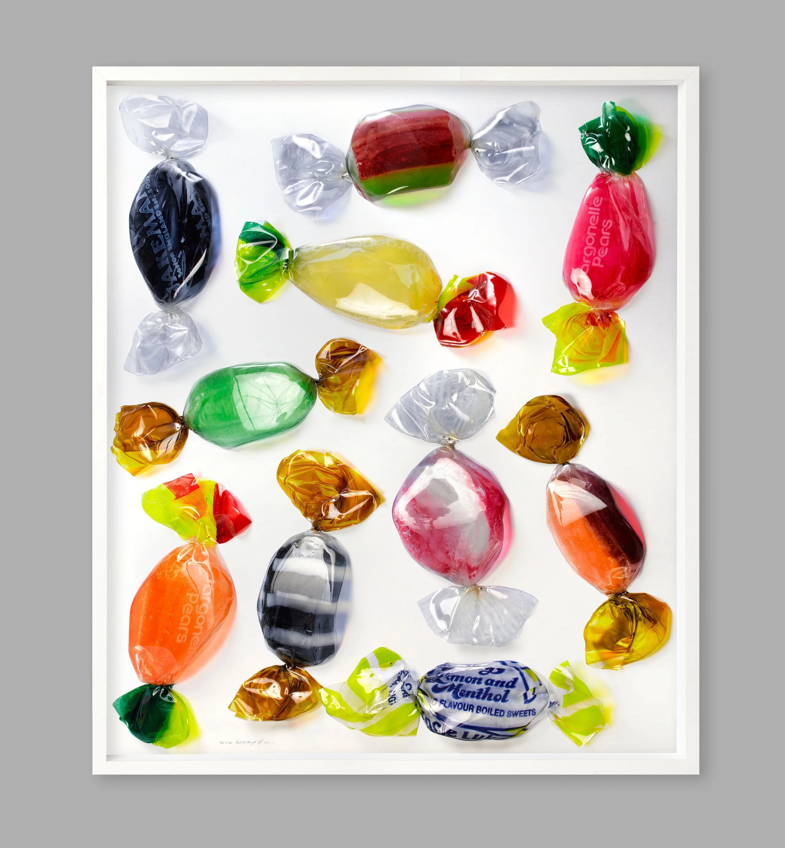 Perish The Thought, (b.1960) , Pick ‘N’ Mix, 2019, Heat moulded and shaped clear film with coloured inks Pinned and framed in dark graphite box frame, 142 x 122cm. Unique.