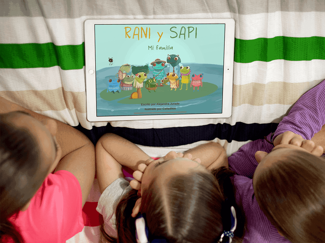 three young girls sit on bed to read fabulingua comprehensible input stories in spanish on ipad