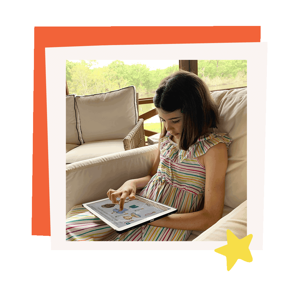 young girl plays fabulingua spanish games at home on ipad
