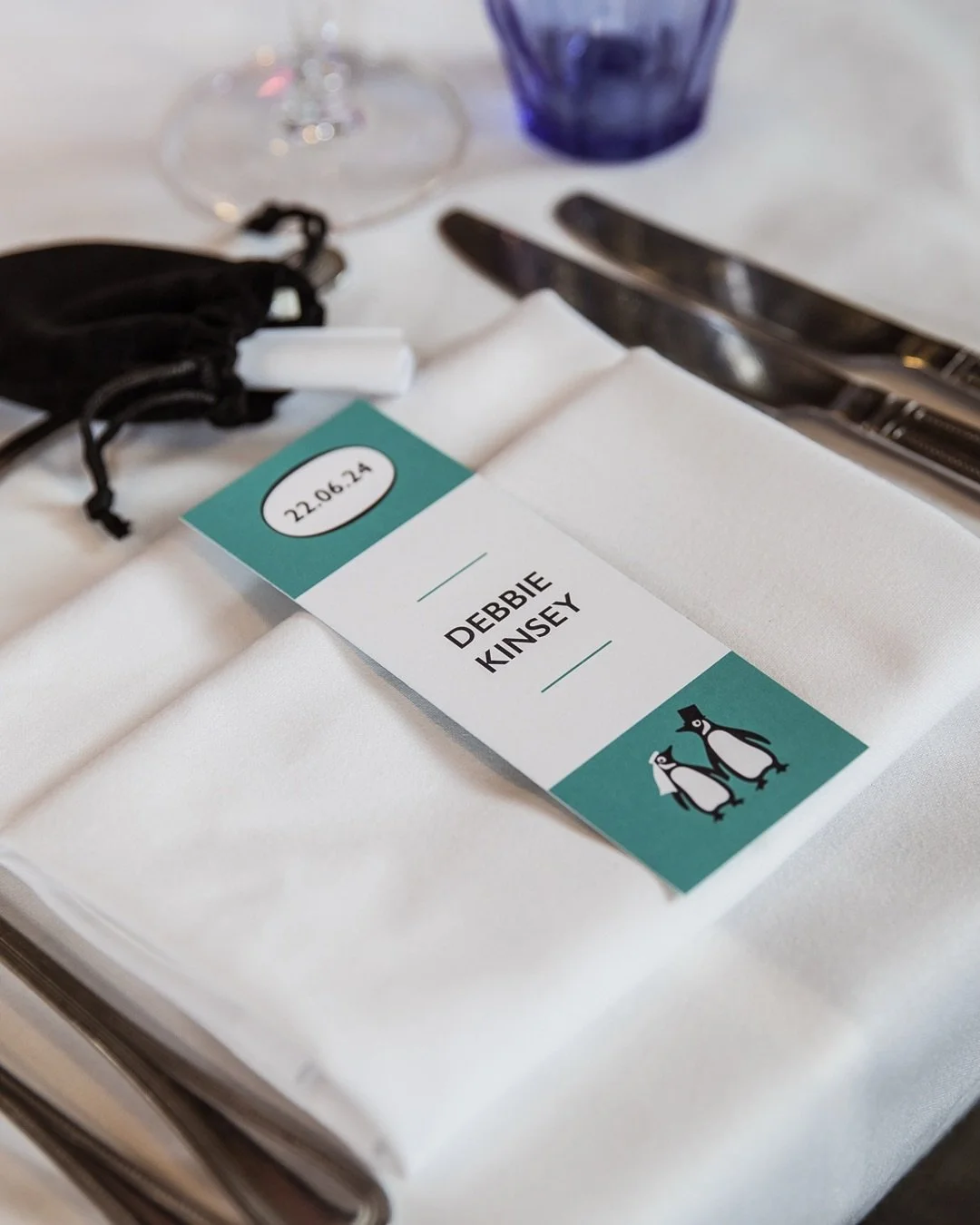 Debbie &amp; Dex knew exactly what they wanted &ndash; a little nod to their love of books woven into their wedding day.

So we made it happen.

A penguin table plan, bookmark place cards, and a design flexible enough to fit their unique table layout