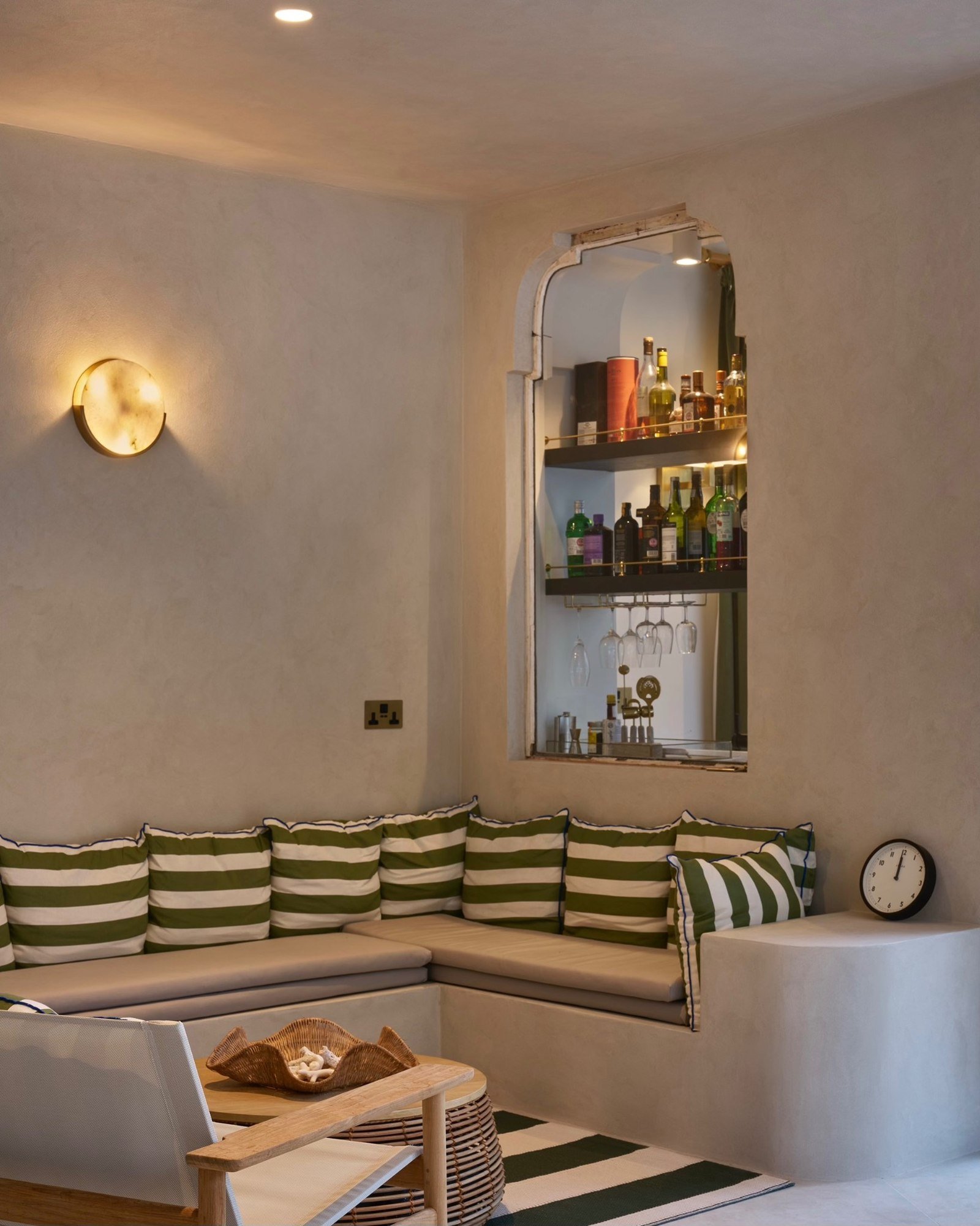 Bespoke microcement built-in seating with soft curved edges in Didsbury, Mancheste