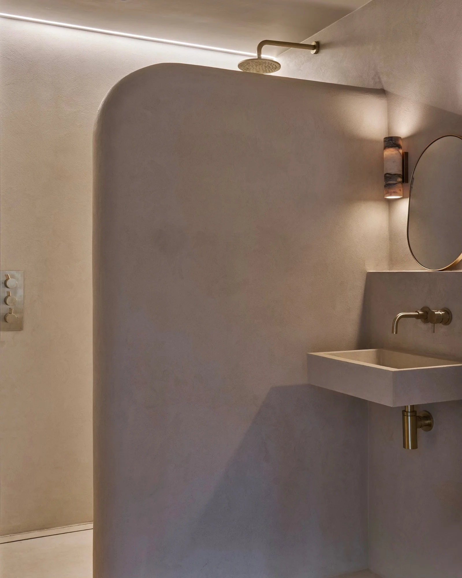 Microcement shower and microcement basin, natural stone, beige colour in Didsbury, Manchester.