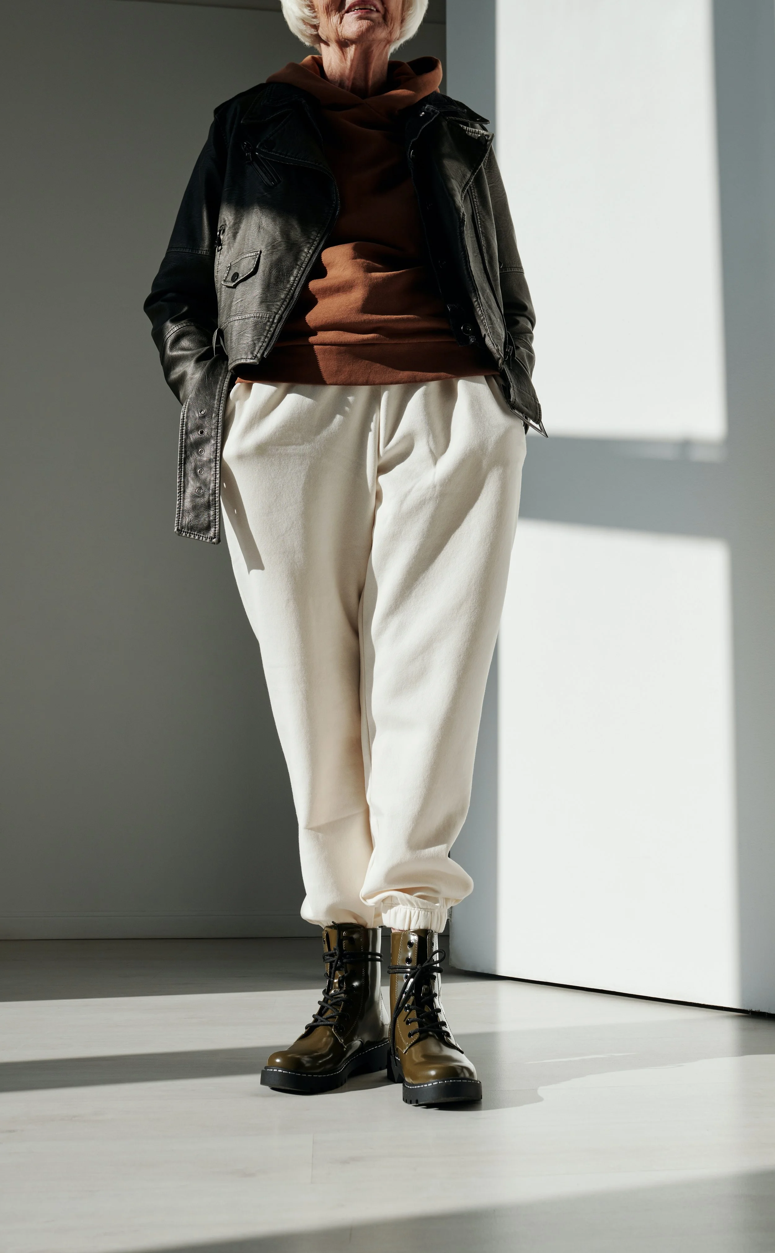 5 Tips for Wearing Boots Over 65, According to Style Experts