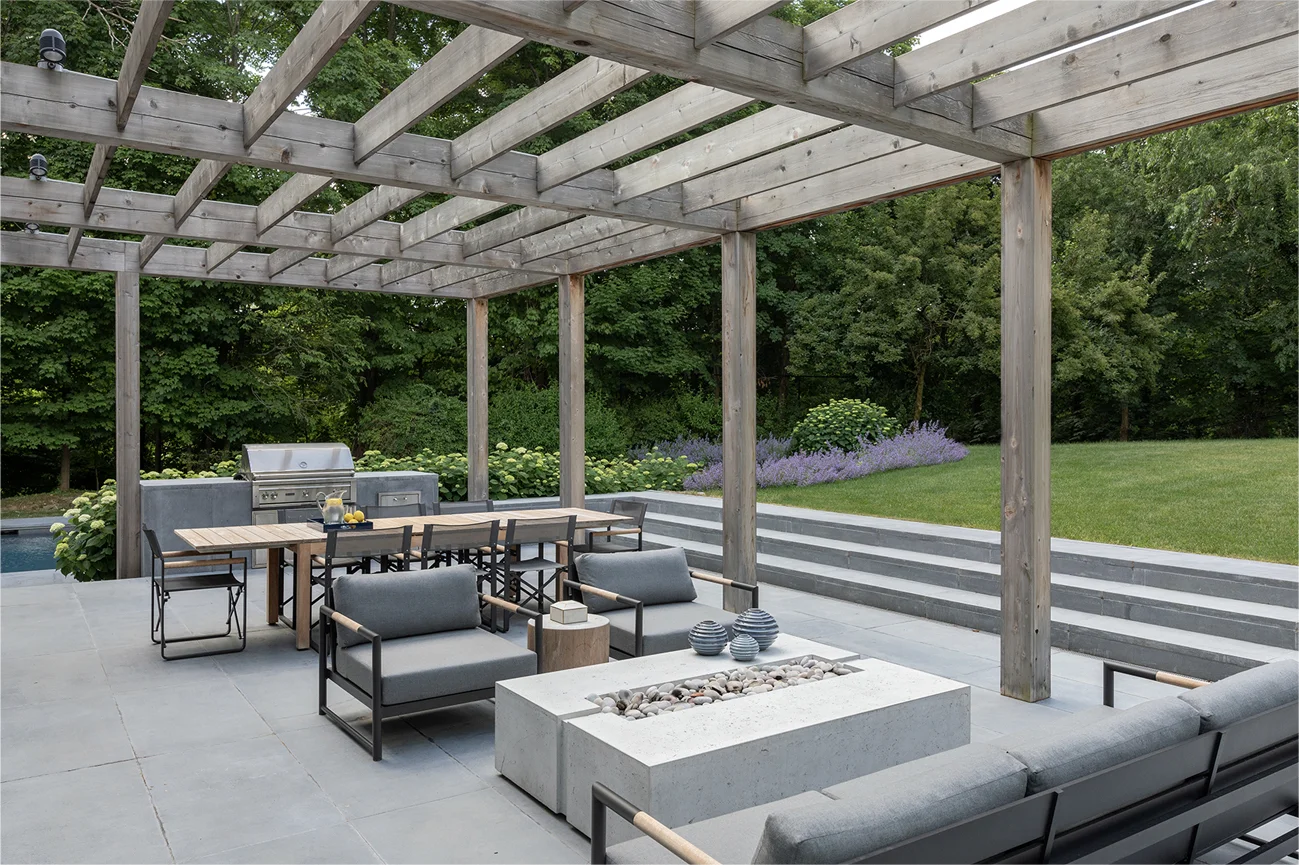 Mid-century Modern Farmhouse Pool Terrace with Trellis Over Patio and Outdoor Fireplace