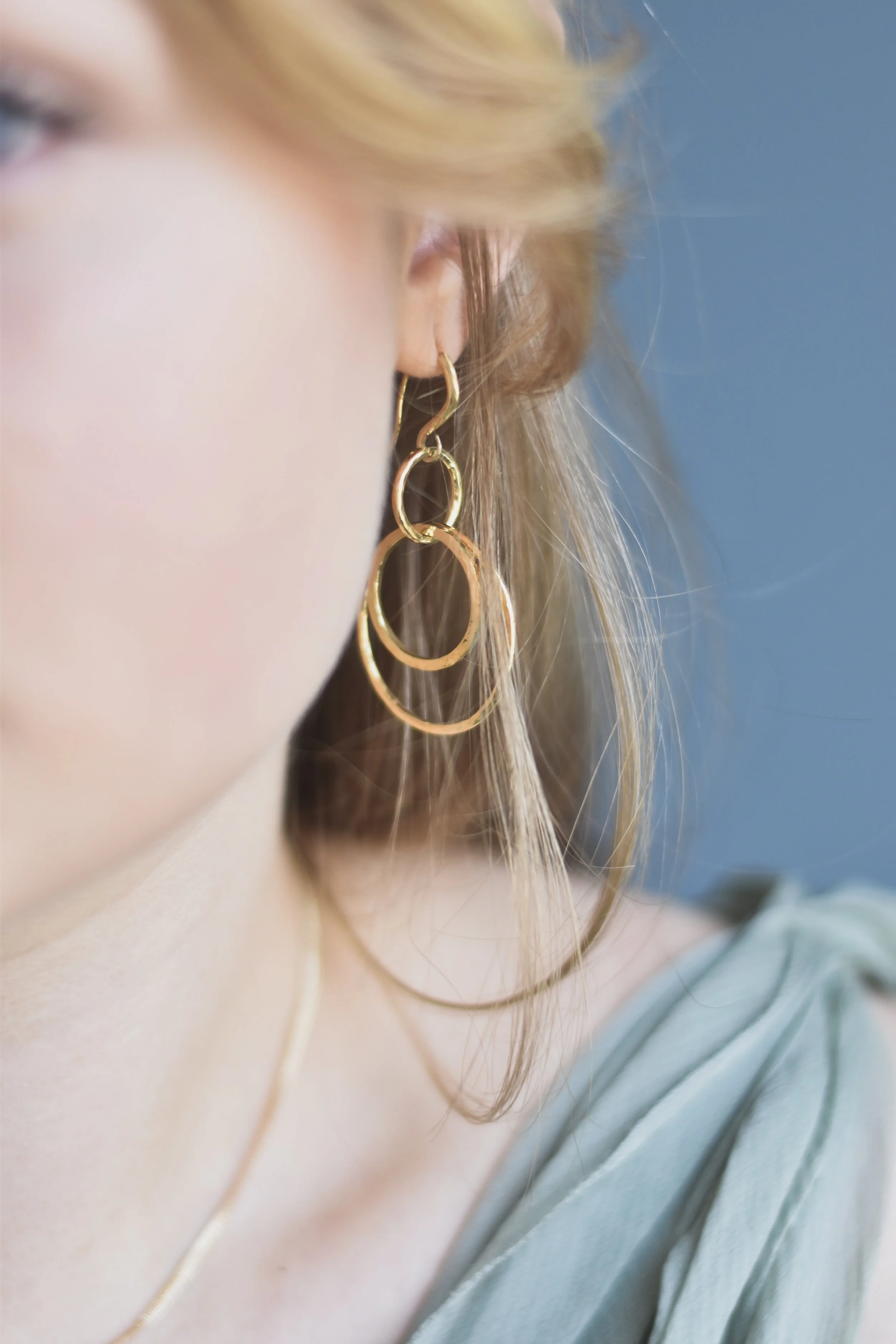 Hammered circle dangling earrings gold Militza Ortiz