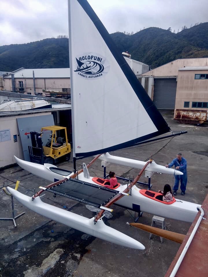 Holopuni-setting up new canoe in shop 2.jpg