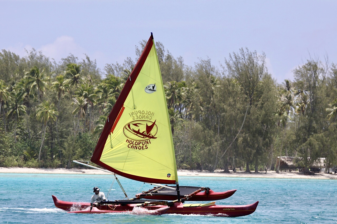 Holopuni Moorea cruising in the lagoon of Tiahura, Moorea