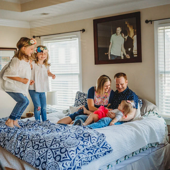 square-image-girls-jumping-on-bed.jpg