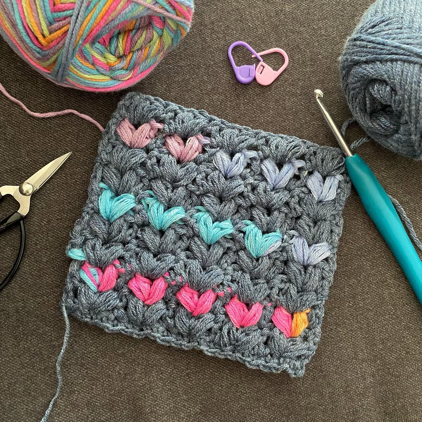 💕 Heart&rsquo;s Desire Scarf &ndash; In the Works! 💕

I&rsquo;m so excited to get started on my newest design for @Hobbii_yarn ! Just look at that swatch&mdash;those colors are absolutely stunning! 🌈✨ 

The heart motif comes to life with the puff 