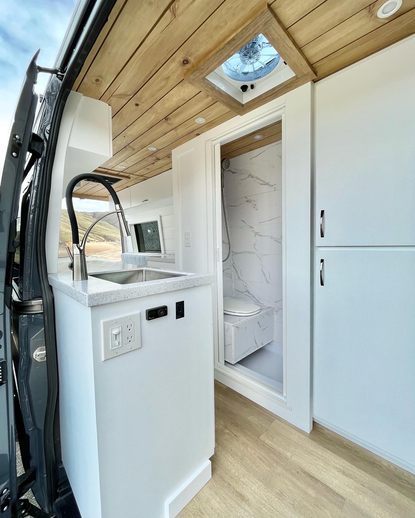 Beach House — Custom Crafted Vans | Luxury Custom Van Conversions