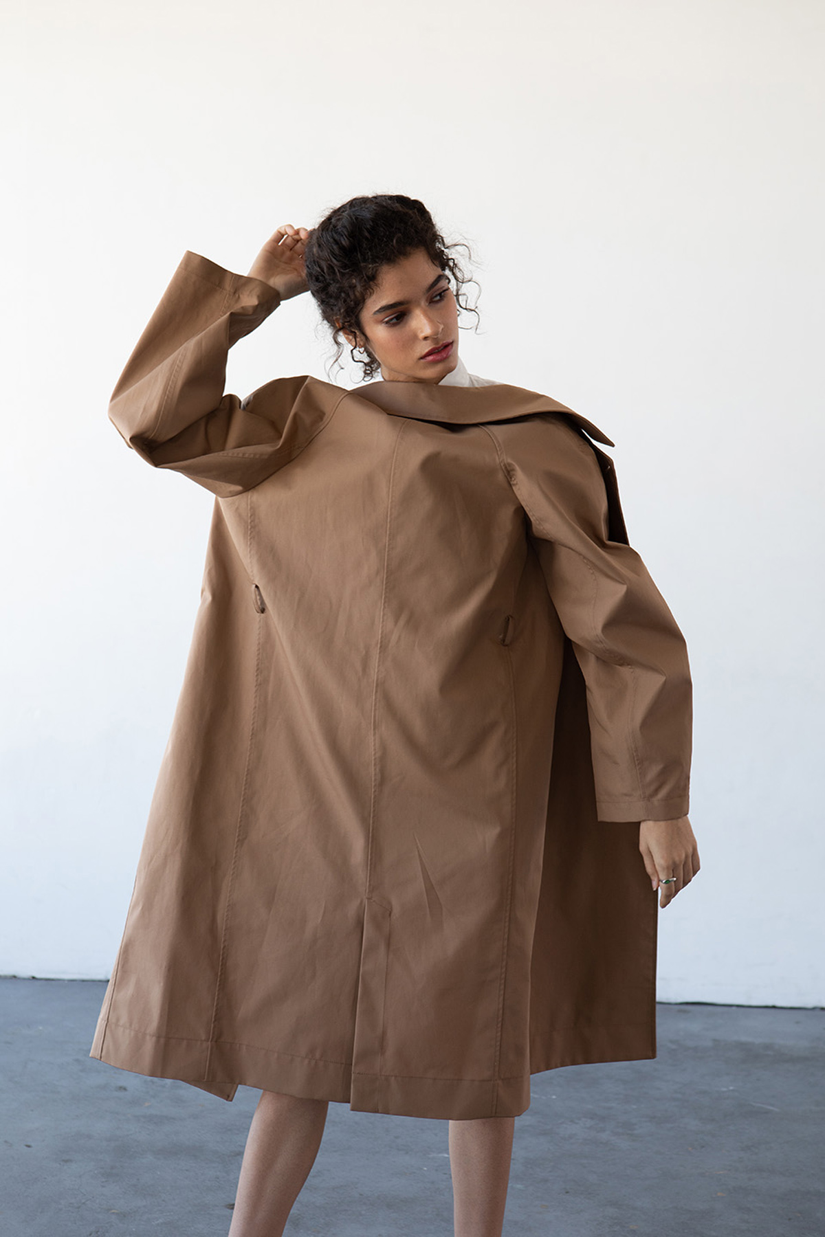 Haro in a raincoat styled shoot by Michele LoBosco, Los Angeles editorial photographer