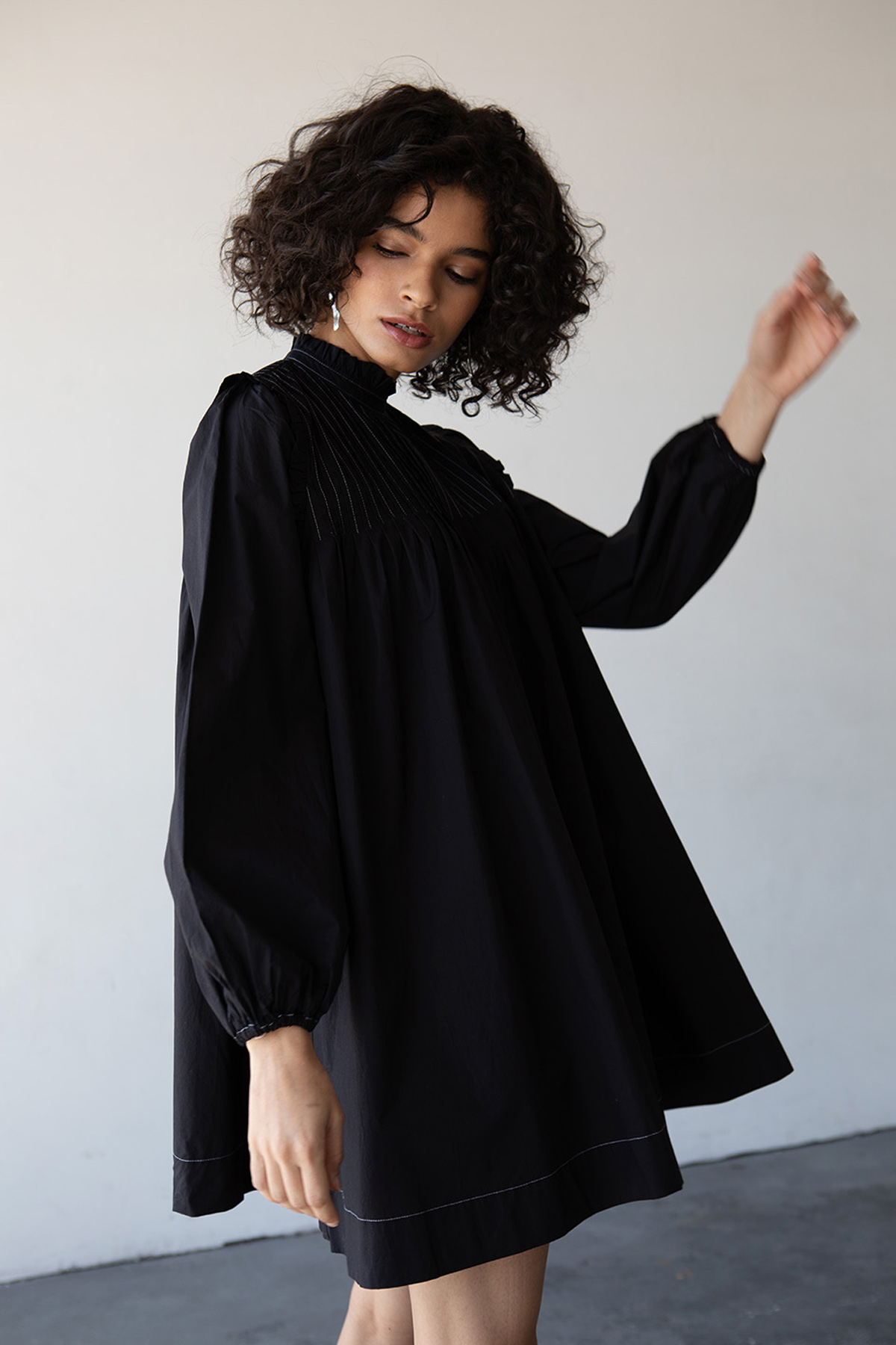Haro in a raincoat styled shoot by Michele LoBosco, Los Angeles editorial photographer