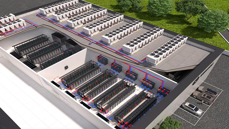Aerial view of a data center with rows of server racks, cooling units, and ventilation systems, surrounded by parking and greenery.