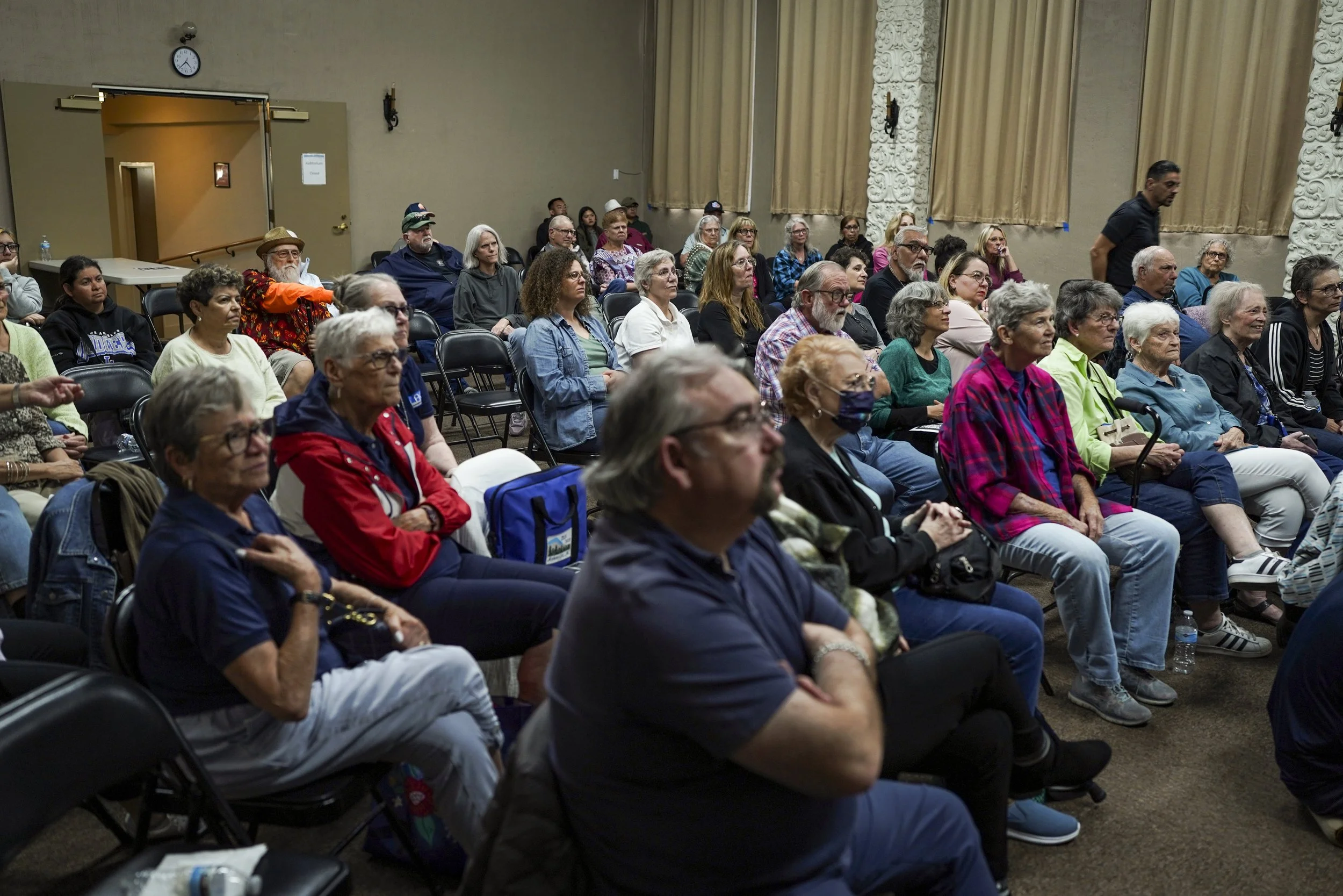 Audience members sit closely together during a discussion following a screening of Being Michelle.
