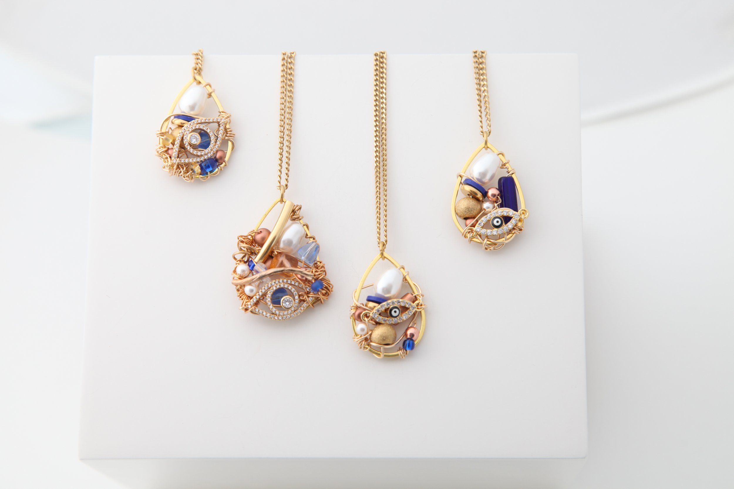14 kt gold eye teardrop pendant 2.JPG