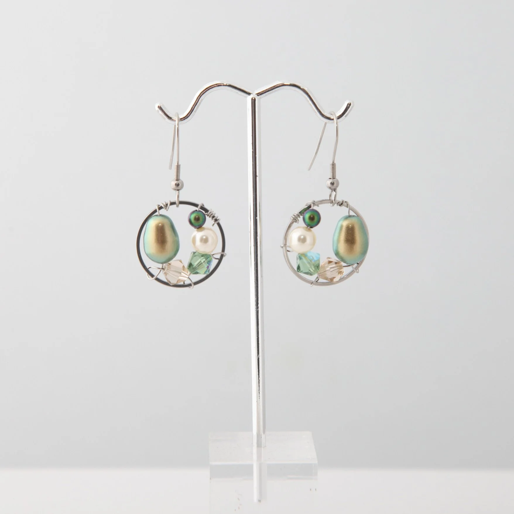 Steel green pearl drop earrings pic1.jpg
