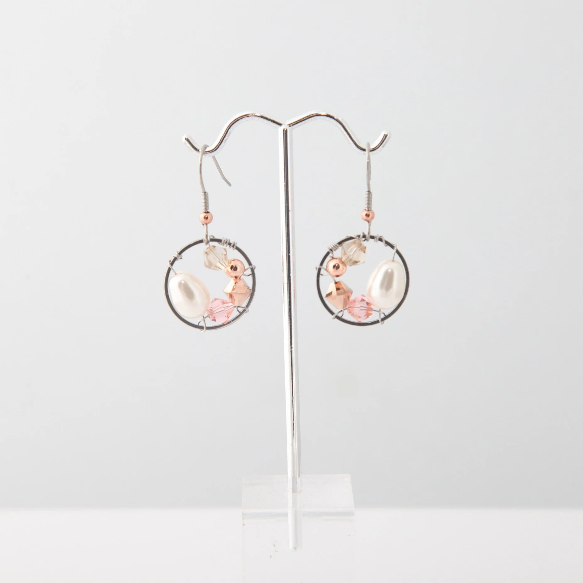 Steel white pearl drop earrings pic1.jpg