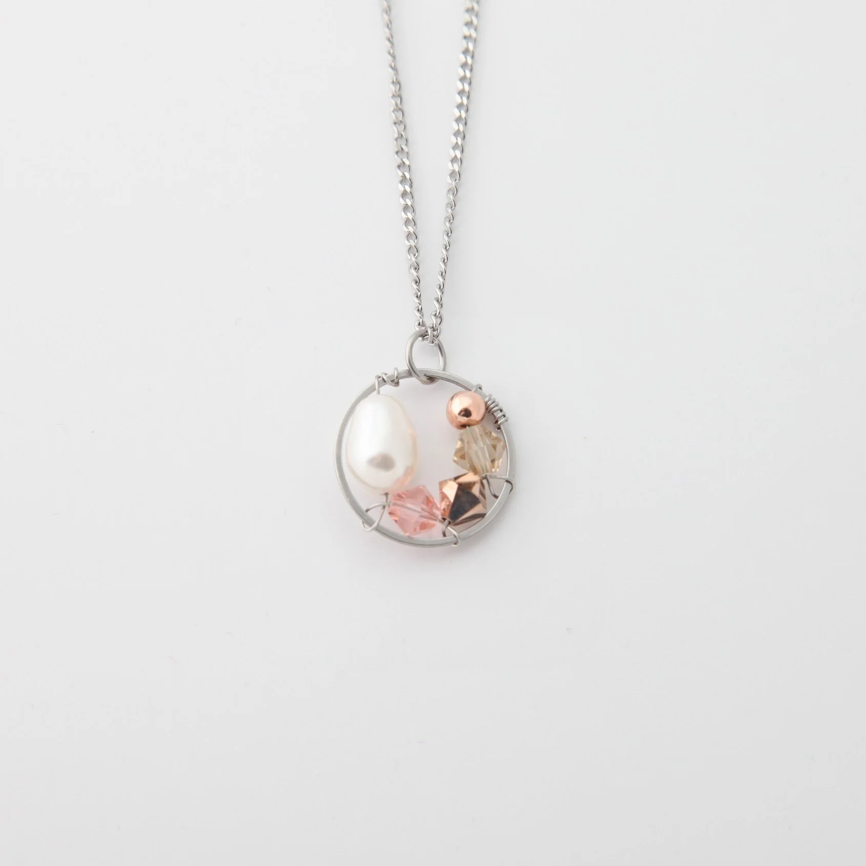 Steel white pearl drop necklace.jpg