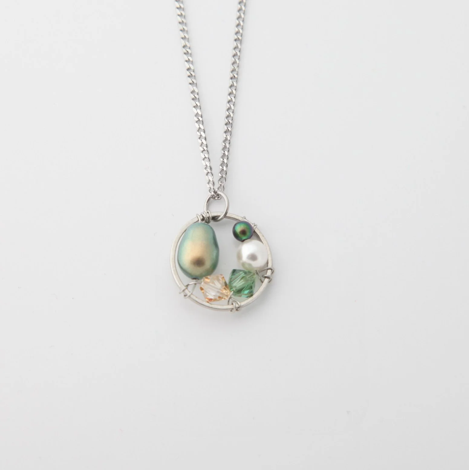 Steel green pearl drop necklace pic1.jpg
