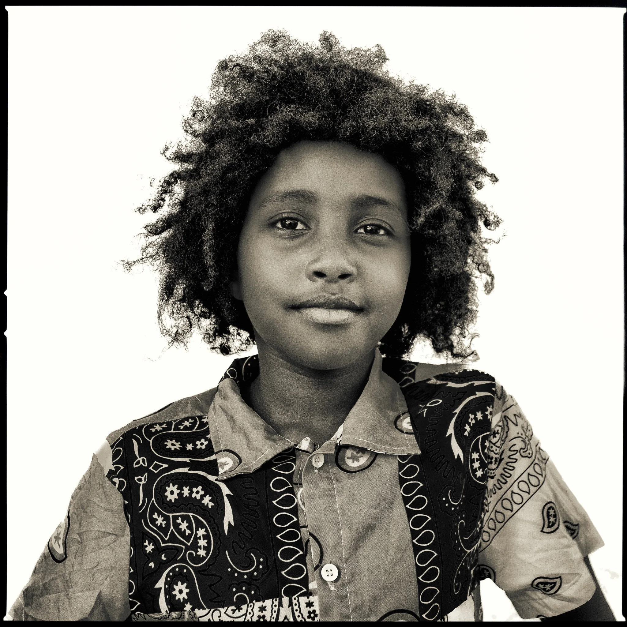 Adidas, age 9 (Photographed with permission of his father). 