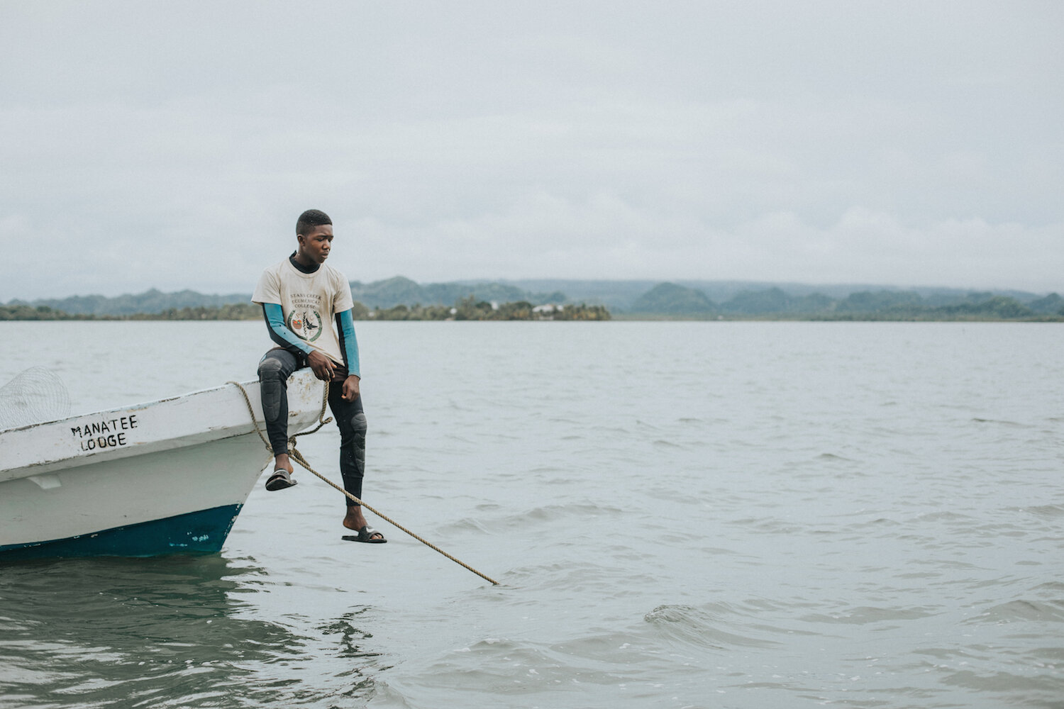A young local who assists in the turtle tracking process. 