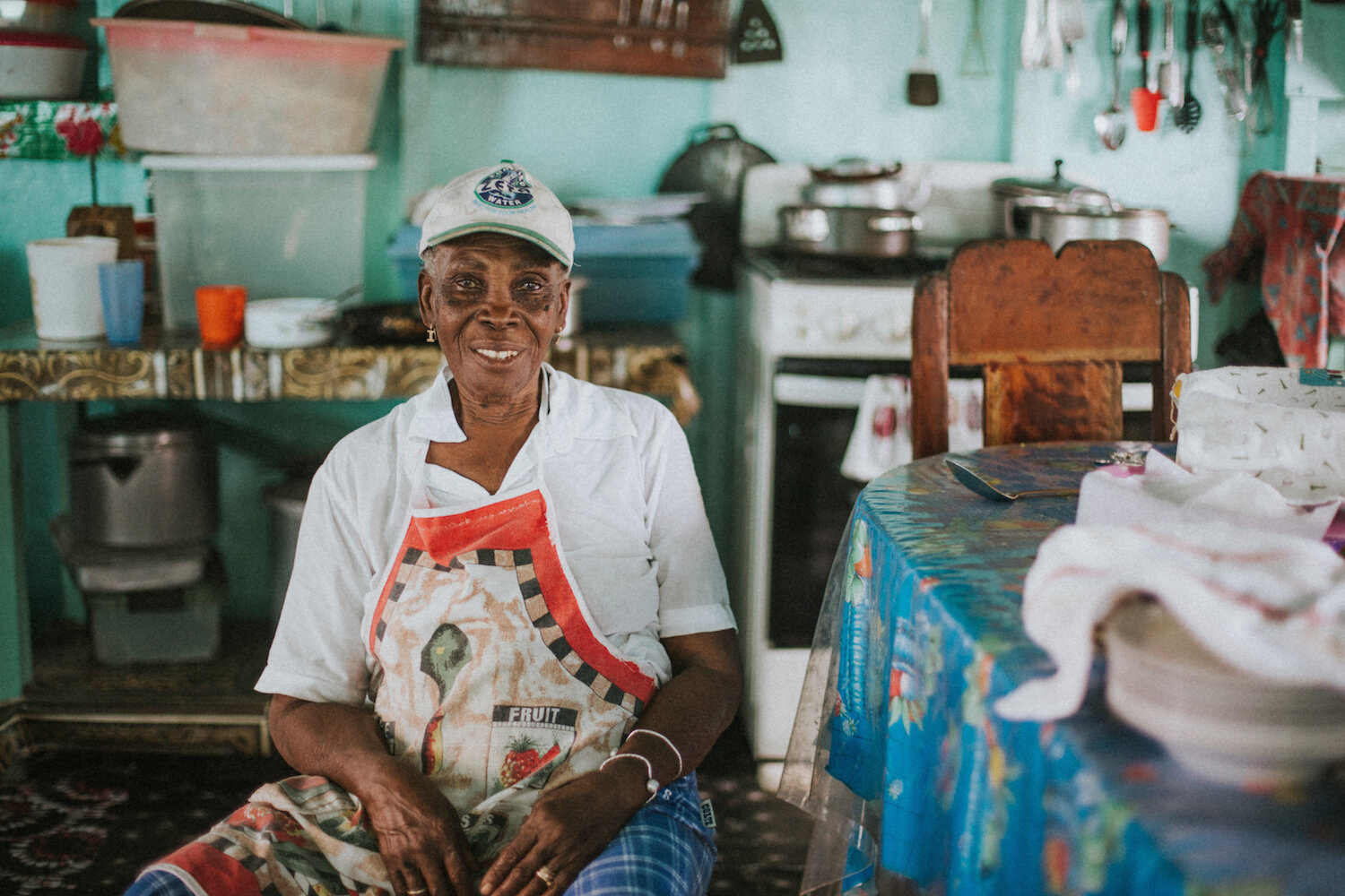 Ms. Gentle, her husband, and their daughter run Gentle's Cool Spot, the hotspot of the village where people come to enjoy traditional creole food and beverages, including Belikin, the official beer of Belize, and homemade wines.