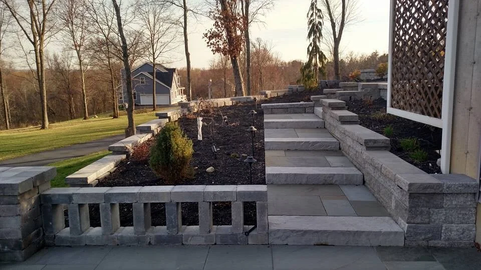 The Benefits of a Retaining Wall in a Sloped Backyard in Chester and Middletown, NY Areas